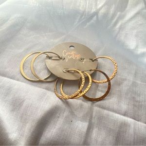 Three pairs of hoop earrings. Good condition and  gently used